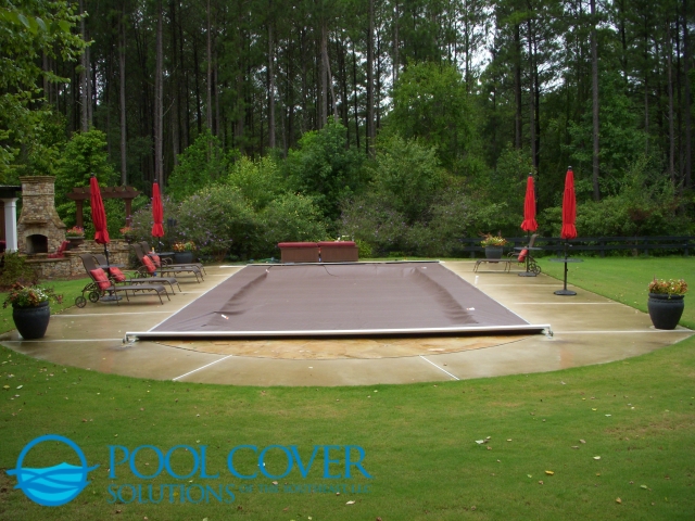 Mt Pleasant SC Automatic Pool Cover System with Stone and Concrete Decking