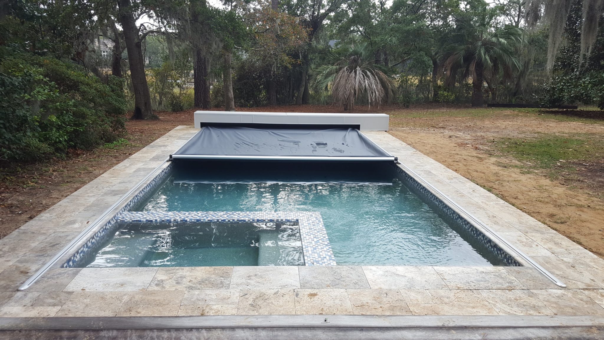 automatic pool cover installation with custom bench